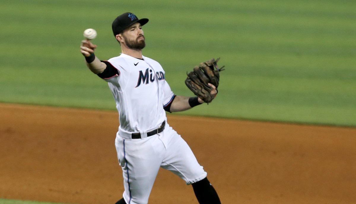 Miami Marlins Jon Berti (5) throws the ball to first base in the third inning as they play the Philadelphia Phillies at loanDepotpark in Miami, Florida, May 25, 2021.