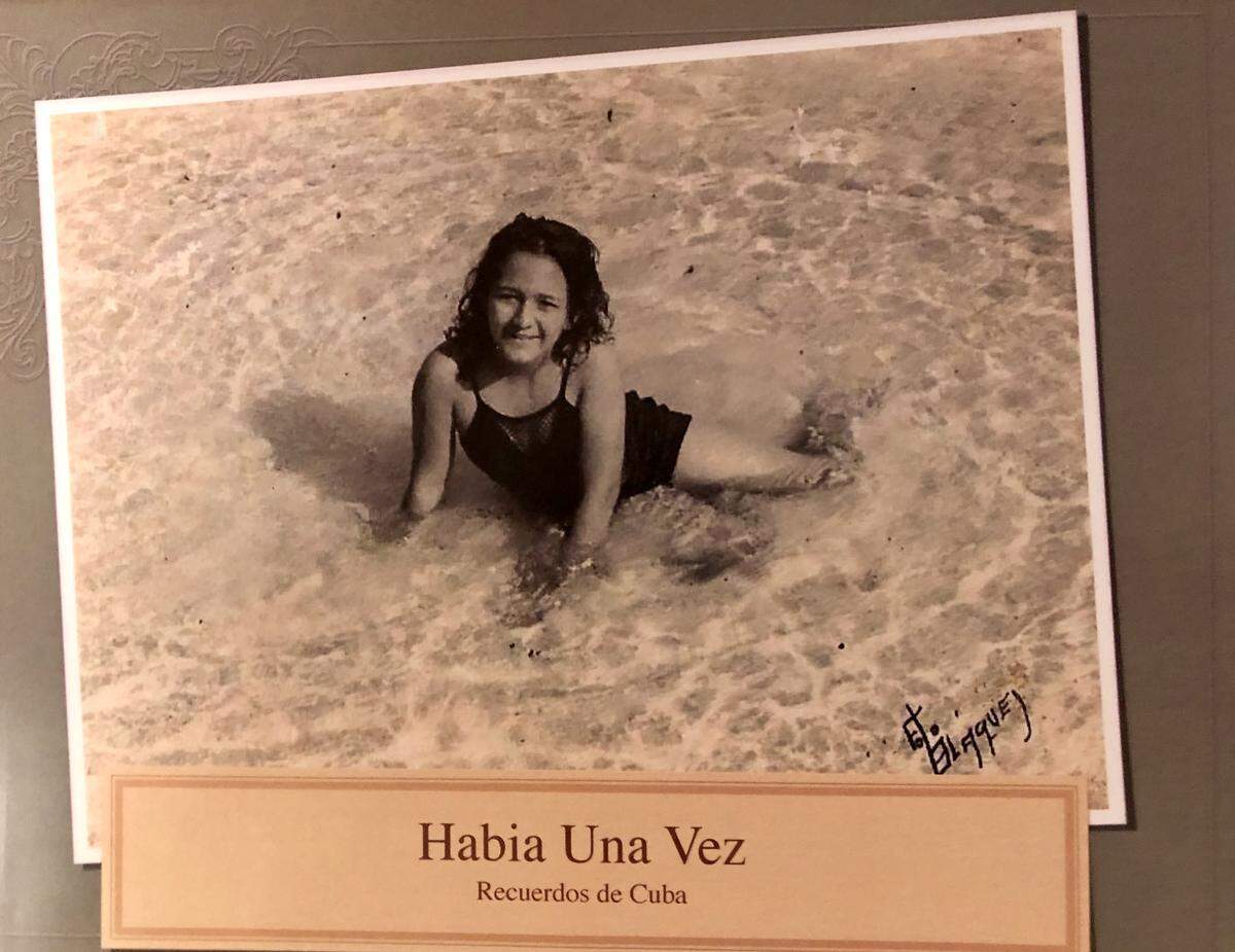 In the cover story of this photo book, “Once Upon a Time, Memories from Cuba,” the writer’s mother frolics in the beach as a teen.