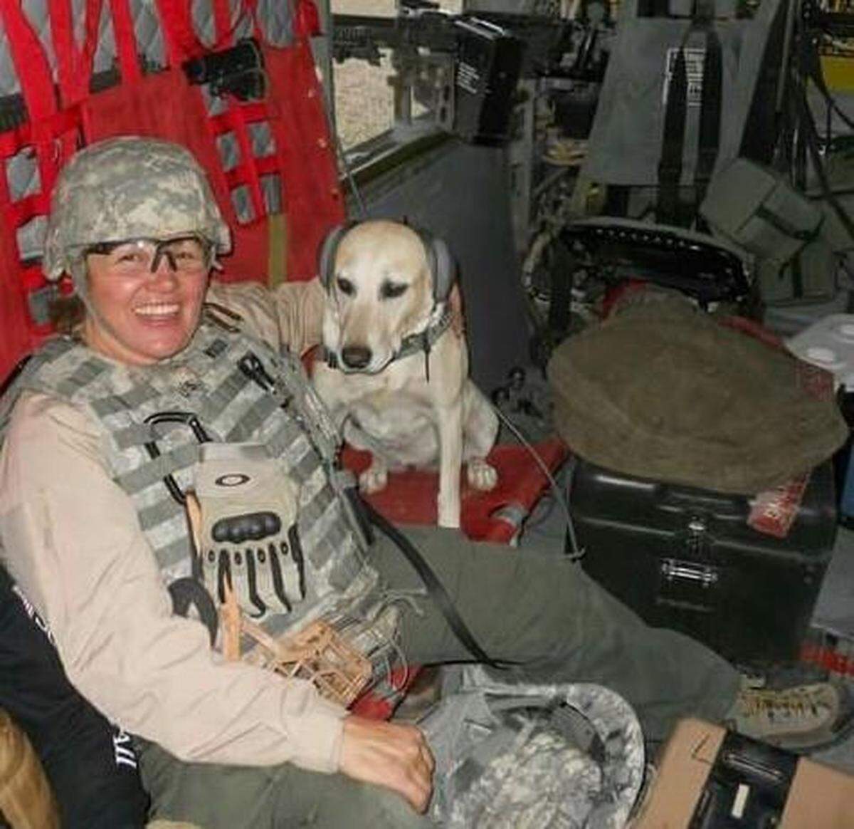 Hilda Wood pictured with Spirit in 2010 in Iraq in a helicopter.