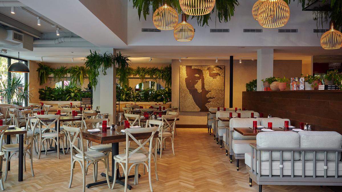 Plan your romantic dinner at one of these Miami restaurants, like the newly remodeled Michael’s Genuine Food & Drink in the Design District.