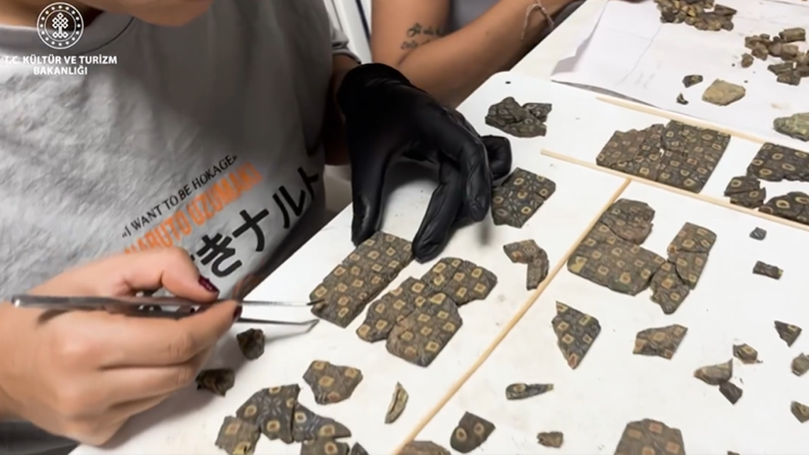 Elaborate decorative glass tiles from the fifth century were found at site of ancient port city, Turkey officials said.