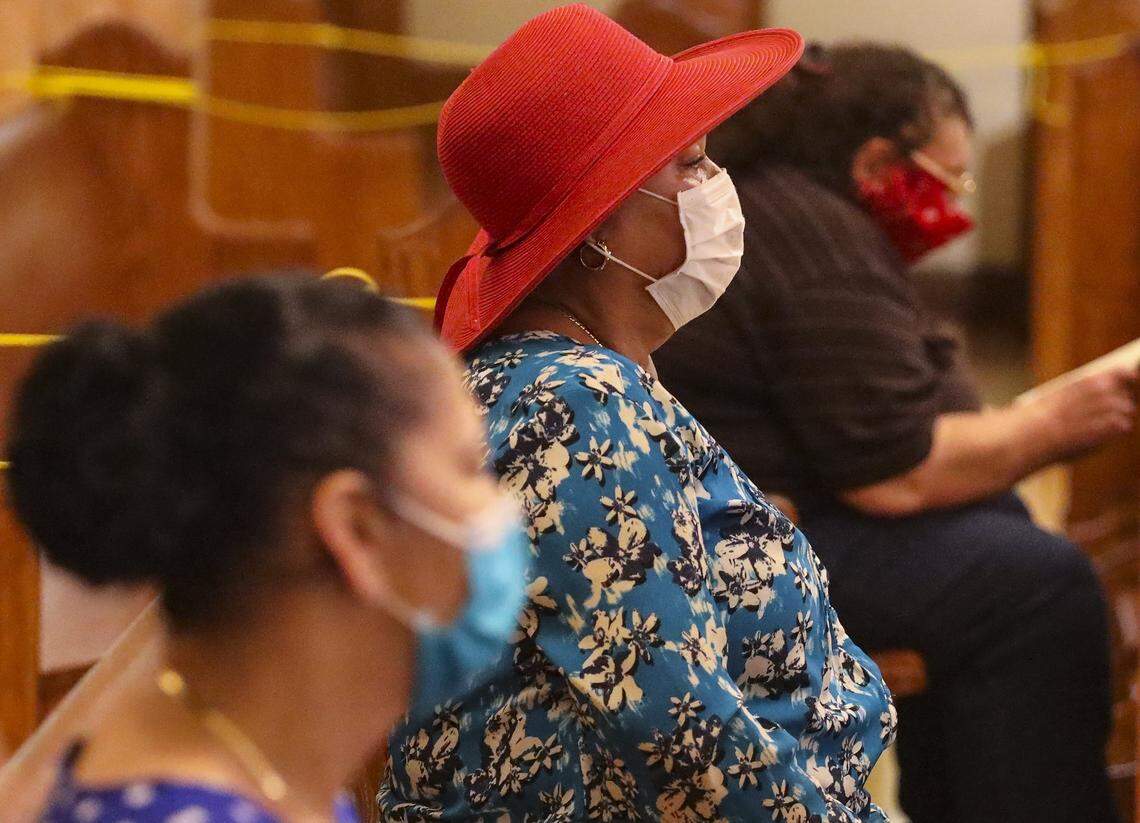 Worshipers attend the 8:15 a.m. English Mass wearing mask and practicing social distancing as the Archdiocese of Miami resumed celebration of Masses on Tuesday, May 26, 2020, at the Cathedral of Saint Mary (St. Mary’s Cathedral) in Miami, Florida. The Archdiocese had suspended in-person Masses in mid-March amid the spread of COVID-19.