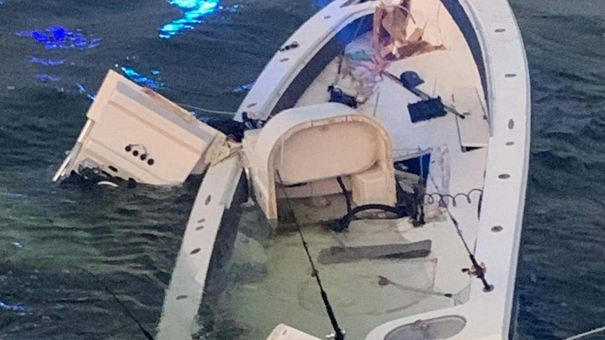 A badly damaged Sea Hunter center console floats next to the South Pine Channel Bridge in the Lower Florida Keys on Monday, July 8, 2024.