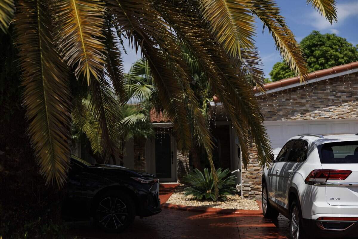 The house of Fernando Armando Valdés Pérez, who was deported for being a spy for Cuba, sits with multiple cars in the driveway during the day on Thursday, Sept. 3, 2026, in Kendall, Fla.