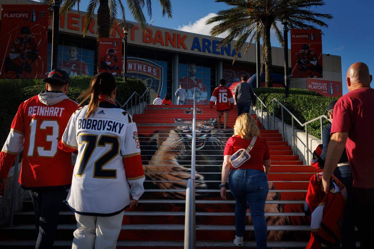 Florida Panthers fans walk up the Panther steps to the arena before Game 5 of the NHL Stanley Cup Final at the Amerant Bank Arena