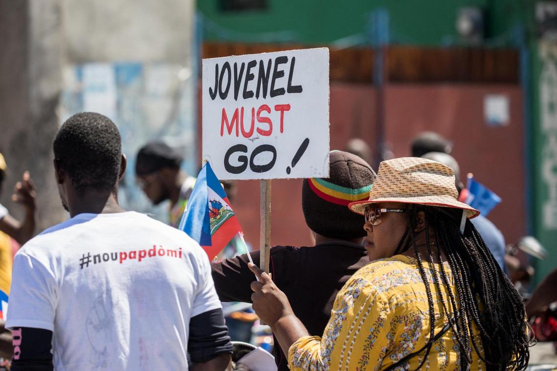 Haitians demonstrate during a protest to denounce the draft constitutional referendum carried by the President Jovenel Moise on March 28, 2021, in Port-au-Prince.