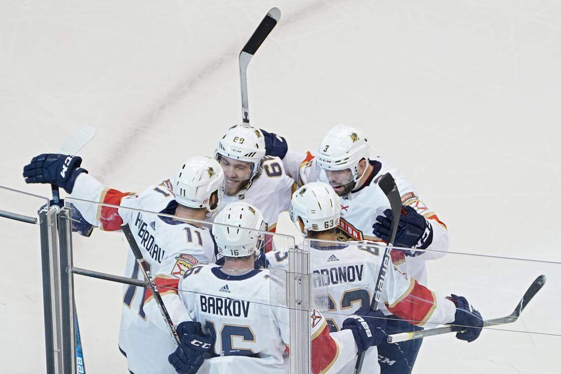 TORONTO, ONTARIO - AUGUST 04: Aleksander Barkov #16 of the Florida Panthers celebrates with teammates after scoring a goal against the New York Islanders during the second period in Game Two of the Eastern Conference Qualification Round prior to the 2020 NHL Stanley Cup Playoff at Scotiabank Arena on August 4, 2020 in Toronto, Ontario. (Photo by Andre Ringuette/Freestyle Photo/Getty Images)