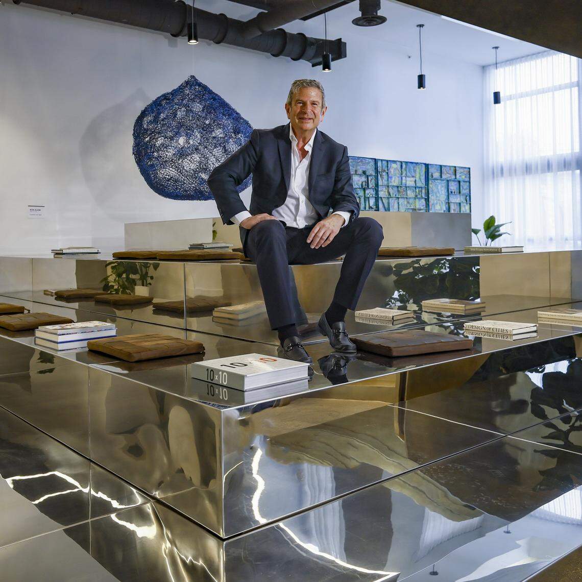 Nir Shoshani, principal at NR Investments, sits in the lobby at the new OMNI District tower UNI at 1642 NE First Ave, in Miami, Florida, on Tuesday, March 31, 2026. The apartments are 100 percent affordable for workforce housing developed with subsidies from the Omni CRA. Shoshani uses a nontraditional model for affordable housing and is breaking ground on a similar tower nearby and has a deal with the city for a third on Calle Ocho