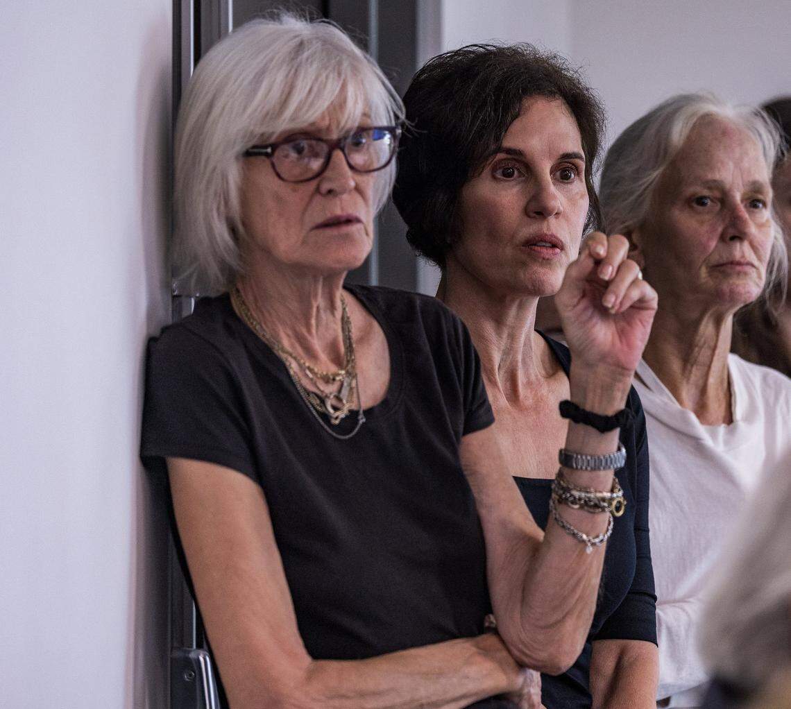 From left- Residents Noelle Haub, Maricis Longo and Bonnie Bolton listen during a Board of Architects meeting at City Hall, to discuss items related to the site located 110 Phonetia Avenue, in the Douglas Section of the City, positioned along East Ponce de Leon Boulevard, bound by Phoenetia Avenue on the North, Antilla Avenue on the South and Galiano Street on the East, in Coral Gables, home of the St. James Evangelical Lutheran Church of Coral Gables and the Crystal Academy, bought by the Century Homebuilders Group in 2021 with plans to develop a project called Crystal, a 9-story mixed-use building,  on Thursday, August 07, 2025.