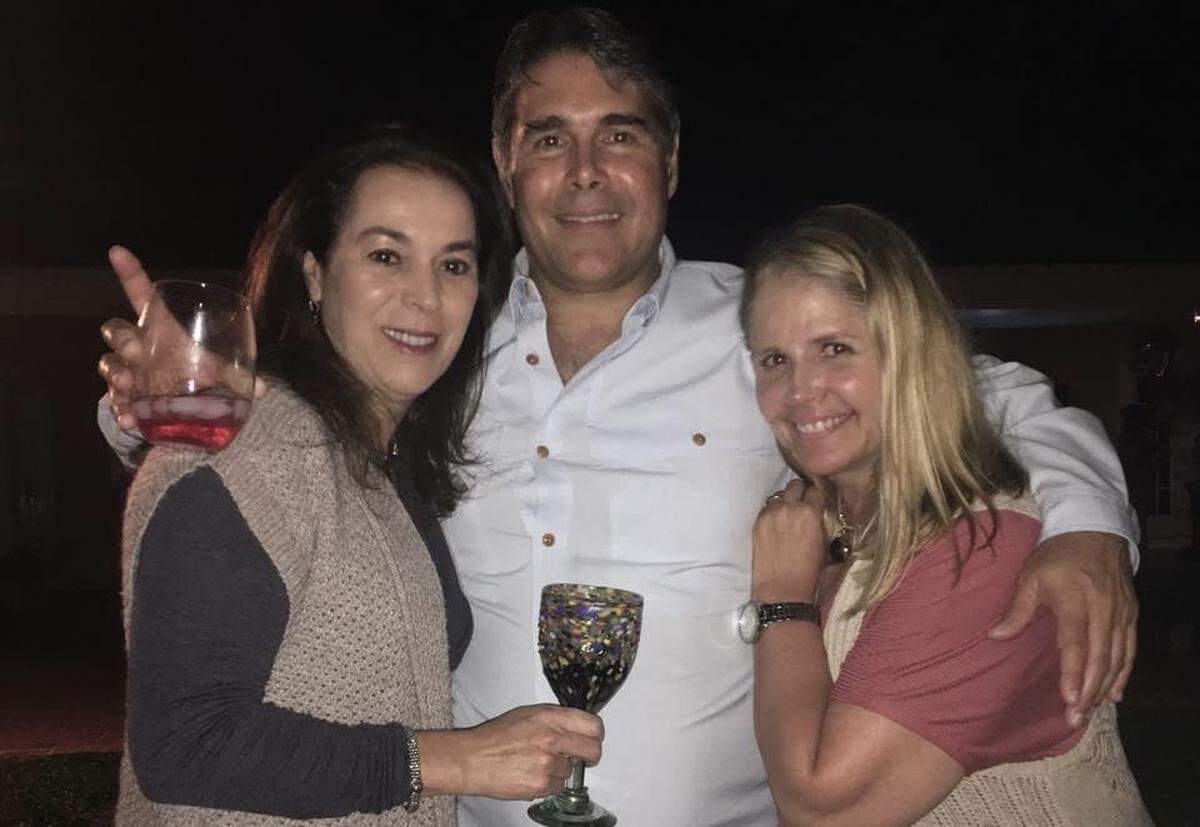 Maria and Richard Rovirosa (left, center) and Natalie Martinez (right) at a recent family gathering, Martinez, Richard’s sister, said.