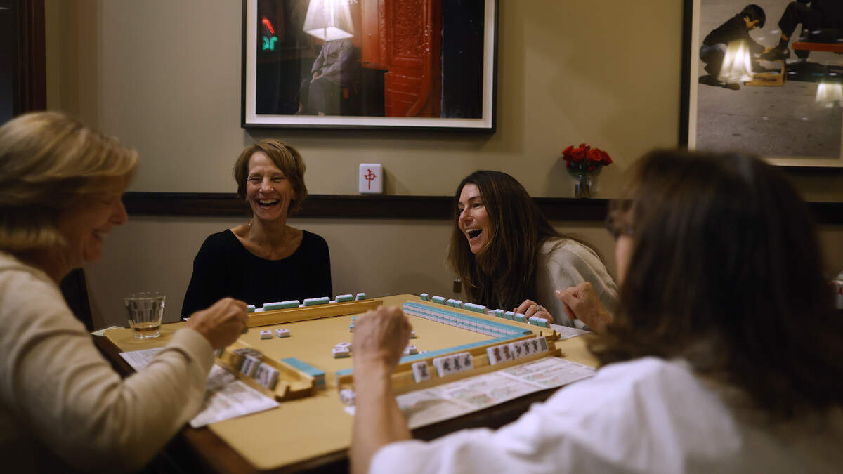 Kelly Dyke, Nancy Weber, Jennifer Hatfield, and Jo Labaugh play Mahjong at the Mahjong Lair at Dragon Well on October 28, 2025 in San Francisco, California.