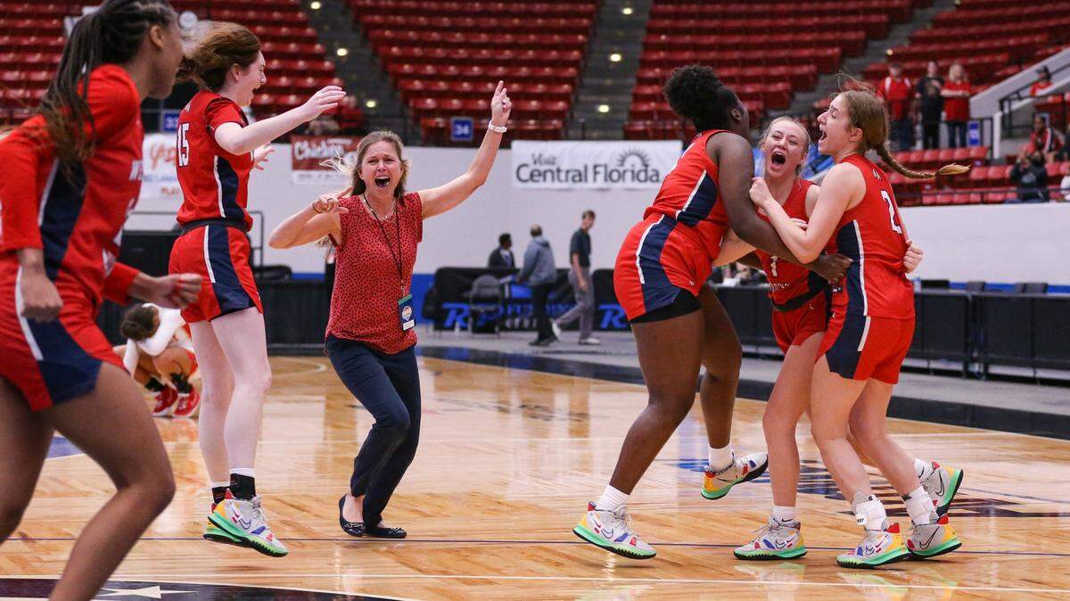 Westminster Academy head coach Shannon Wallhoff joins players on the court after the team defeats Cardinal Mooney in a Class 3A girls basketball state championship at the RP Funding Center in Lakeland on Friday, February 25, 2022.