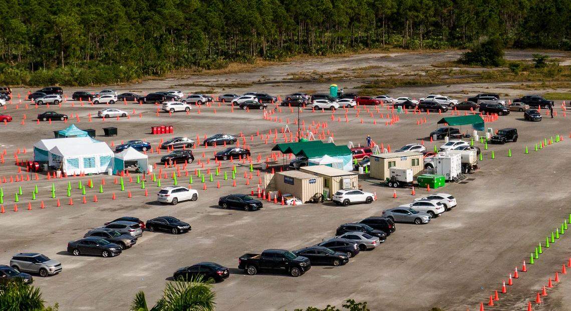 Cars line up at Zoo Miami for the COVID-19 test on Tuesday afternoon, Jan. 4, 2021.