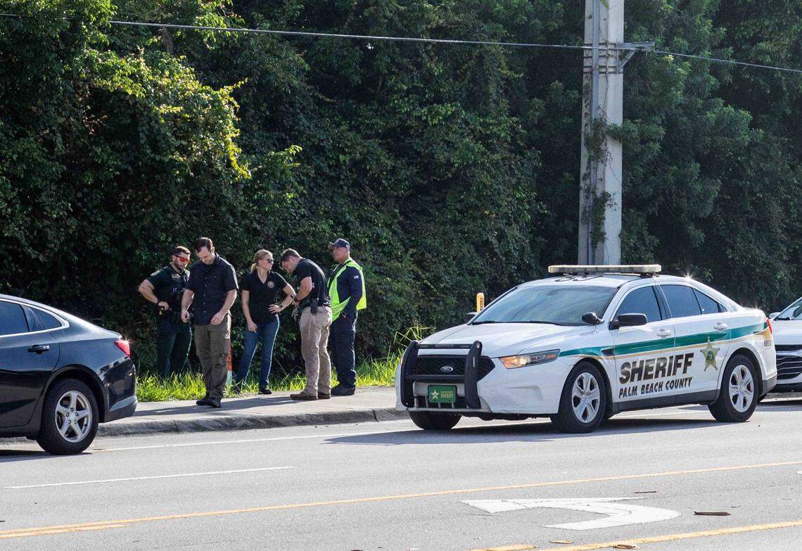 Palm Beach sheriffÕs deputies and first responders stand on Gun Club Rd. behind Trump International Golf Club where the FBI is investigating an attempted assassination of former President Donald Trump September 15, 2024.