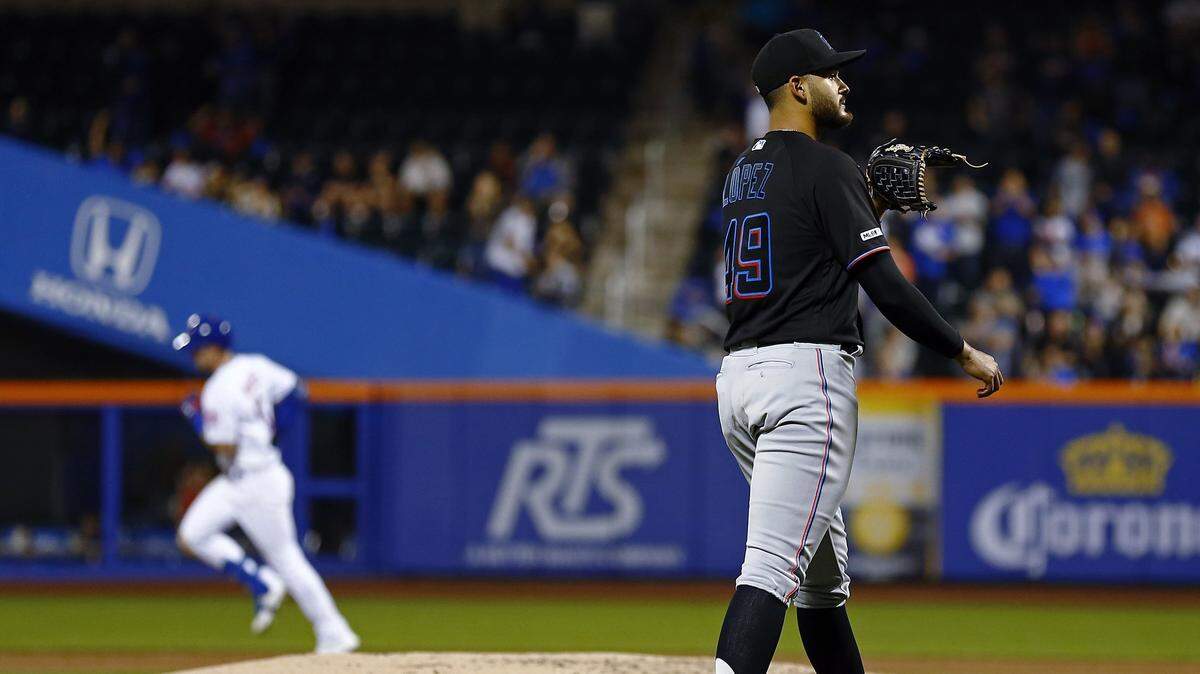 Miami Marlins pitcher Pablo Lopez (49) waits for a new ball after giving up a solo home run to New York Mets’ Jeff McNeil during the third inning of a baseball game on Friday, May 10, 2019, in New York.