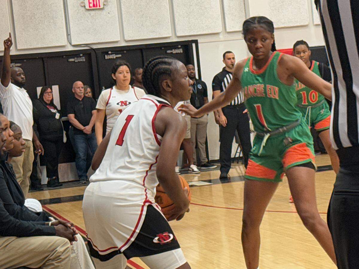 Northeast senior guard Nykeria Flowers prepares to throw an inbound pass early in the second half of Friday’s Region 4-5A final against Blanche Ely at Northeast High in Oakland Park, Fla.