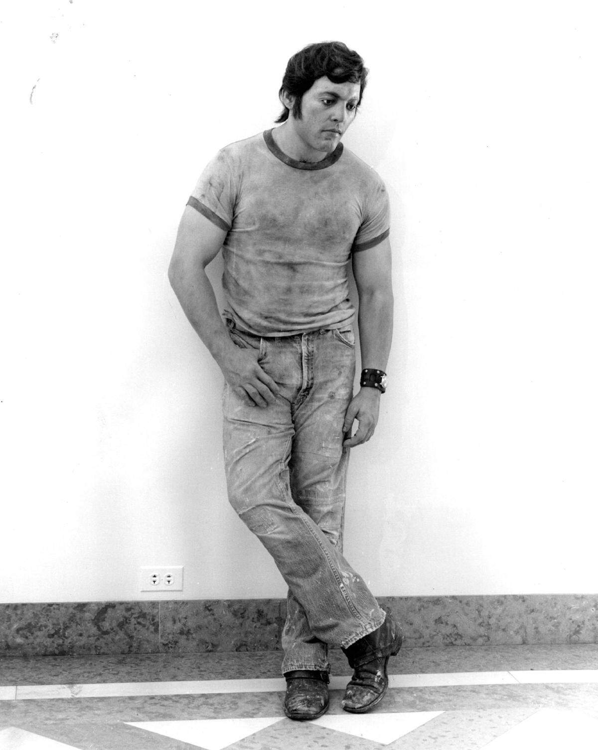 “The Young Worker” can be seen leaning against the wall at the Norton Museum of Art in West Palm Beach. Some people have asked the sculpture, wearing a watch, what time it is.