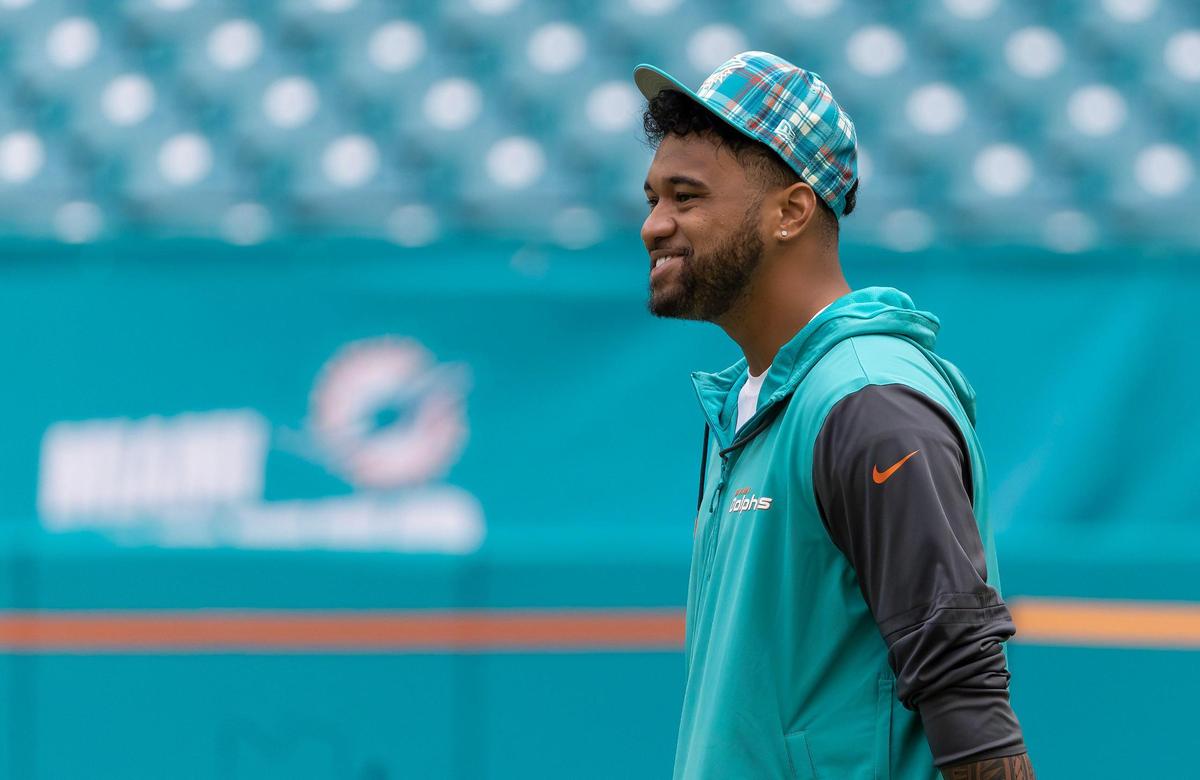 Miami Dolphins quarterback Tua Tagovailoa smiles before the start of their NFL game against the Arizona Cardinals at Hard Rock Stadium on Sunday, Oct. 27, 2024, in Miami Gardens, Fla.