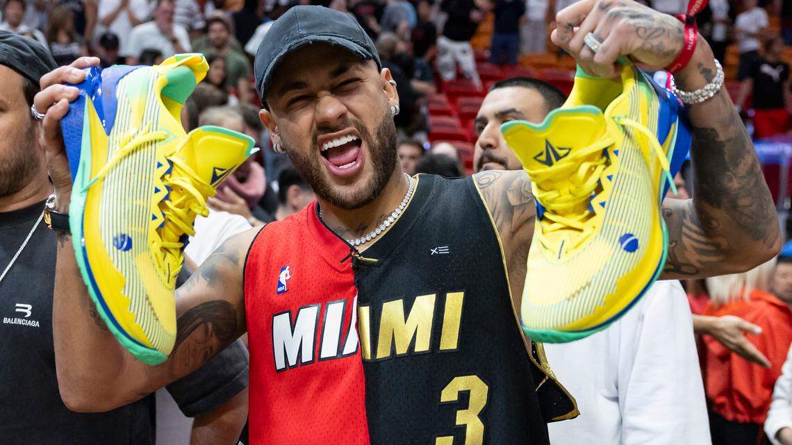 Al Hilal SFC forward Neymar shows off the sneakers Miami Heat forward Jimmy Butler (22) gifted him after his NBA game against the Portland Trail Blazers at the Kaseya Center on Friday, March 29, 2024 in downtown Miami. Rumors of a potential Neymar-to-Inter Miami move heated up Oct. 28, 2024 when he purchased a waterfront property in Bal Harbour.