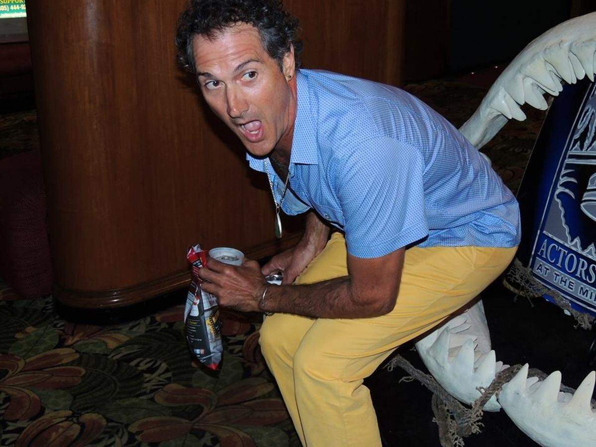 In this file photo from Sept. 5, 2013, Claude Roatta, then-49, returns to The Miracle Theatre 38 years after standing in line around the block to see “Jaws” in the summer of 1975 at the venue. The Miracle held a screening of the blockbuster movie in 2013 as part of a free movie series.