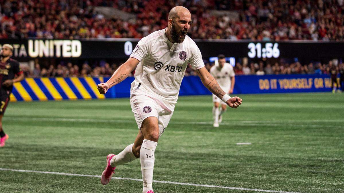 Inter Miami forward Gonzalo Higuain celebrates his penalty kick goal against Atlanta United, but Miami lost the game 2-1.