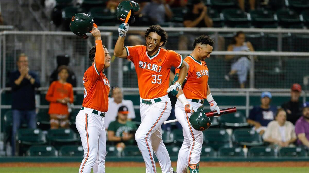 Miami Hurricanes infielder Yohandy Morales (35) celebrates at home plate after hitting a two-run home run in the sixth inning against the Arizona Wildcats during the Coral Gables NCAA Baseball Regional at Alex Rodriguez Park at Mark Light Field in Coral Gables, Florida, Sunday, June 5, 2022.