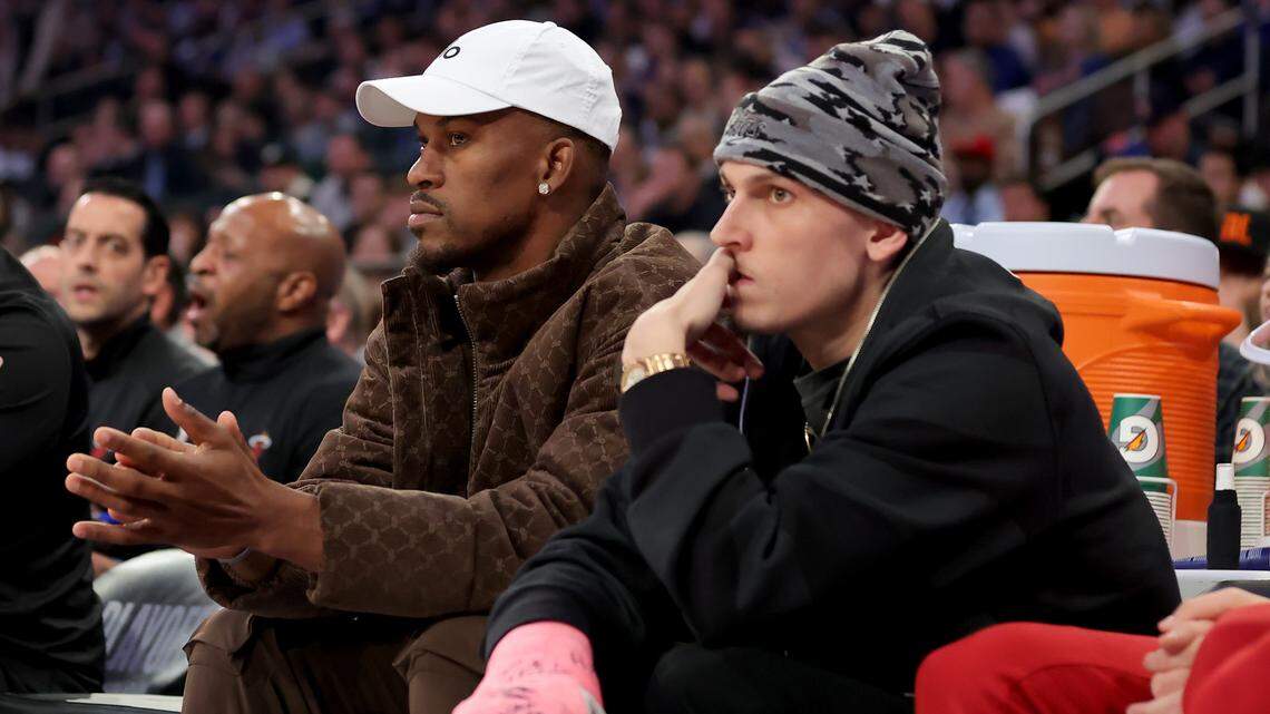 Miami Heat injured forward Jimmy Butler (22) and injured guard Tyler Herro (14) watch from the bench during the first quarter of game two of the 2023 NBA Eastern Conference semifinal playoffs against the New York Knicks at Madison Square Garden.