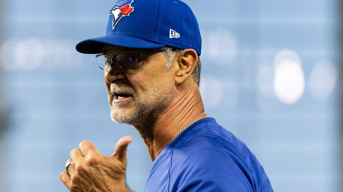 Toronto Blue Jays bench coach Don Mattingly (23) stands on the field during batting practice before his team plays against the Miami Marlins in an MLB game at loanDepot park on Monday, June 19, 2023, in Miami, Fla.