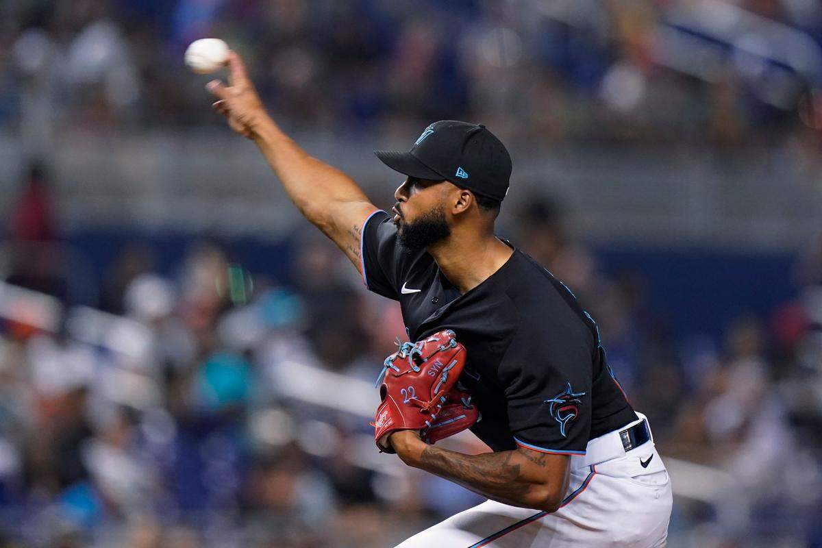 Miami Marlins’ Sandy Alcantara delivers a pitch during the fourth finning of a baseball game against the Cincinnati Reds, Saturday, Aug. 28, 2021, in Miami. (AP Photo/Wilfredo Lee)