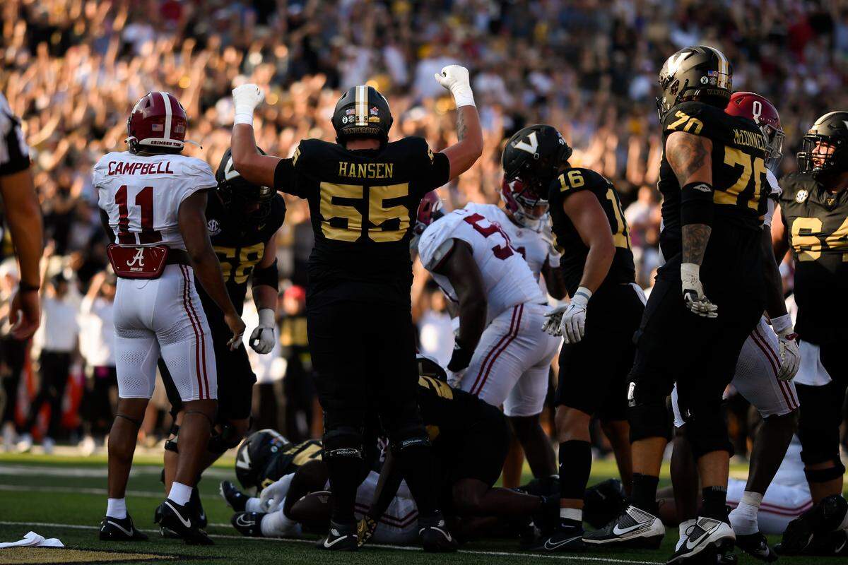 Oct 5, 2024; Nashville, Tennessee, USA;  Vanderbilt Commodores offensive lineman Gunnar Hansen (55) celebrates the touchdown of running back Sedrick Alexander (28) during the first half at FirstBank Stadium. Mandatory Credit: Steve Roberts-Imagn Images