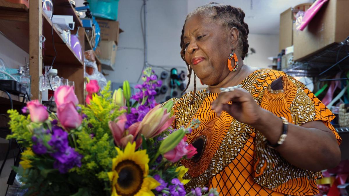 Florist Grace Vernon, who operates Flowers by Grace, prepares an arrangement at her store in the Cloverleaf Plaza in Miami Gardens. Rapper Flo Rida, and his business partner Lee Prince purchased a development, which has been promoted as the city’s first Black-owned plaza.