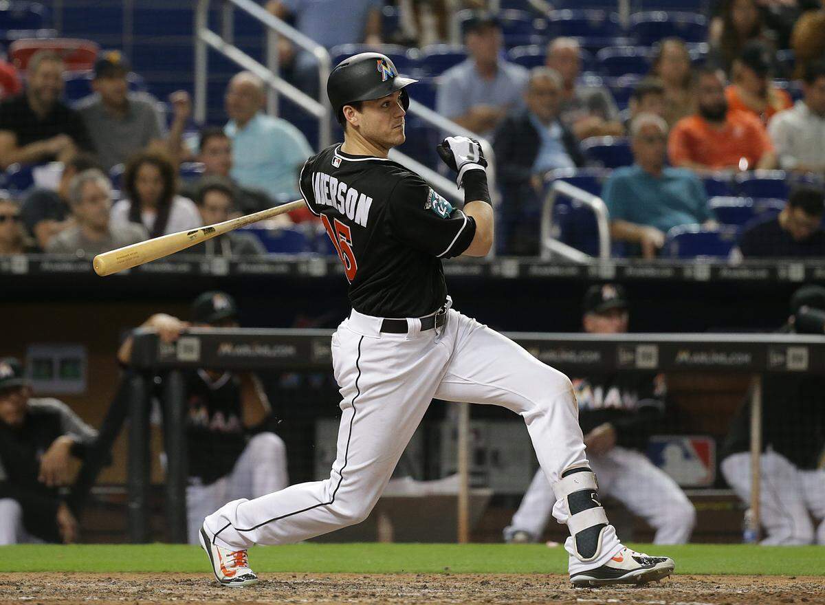 Marlins right fielder Brian Anderson hits an RBI single in the seventh inning of the Miami Marlins vs Washington Nationals game at Marlins Park, Friday, May 25, 2018.