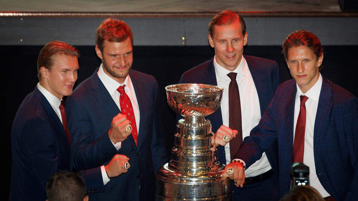 From left to right: The four Finnish players Anton Lundell, Aleksander Barkov, Niko Mikkola , and Eetu Luostarinen pose with their rings and the Stanley Cup during the Florida Panthers 2024 Champions Ring Ceremony on Monday, Oct. 7, 2024, at FTL War Memorial Auditorium in Fort Lauderdale, Fla.
