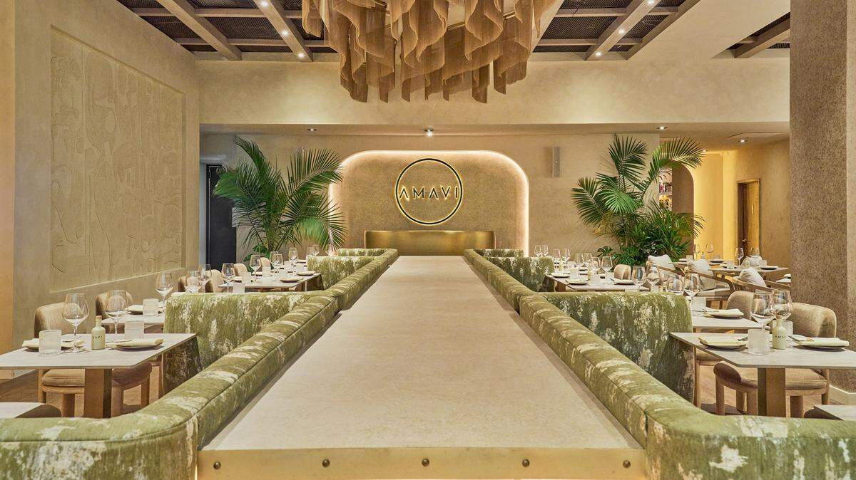 The center walkway transforms into a live performance space as the night goes on at Amavi restaurant in Miami.