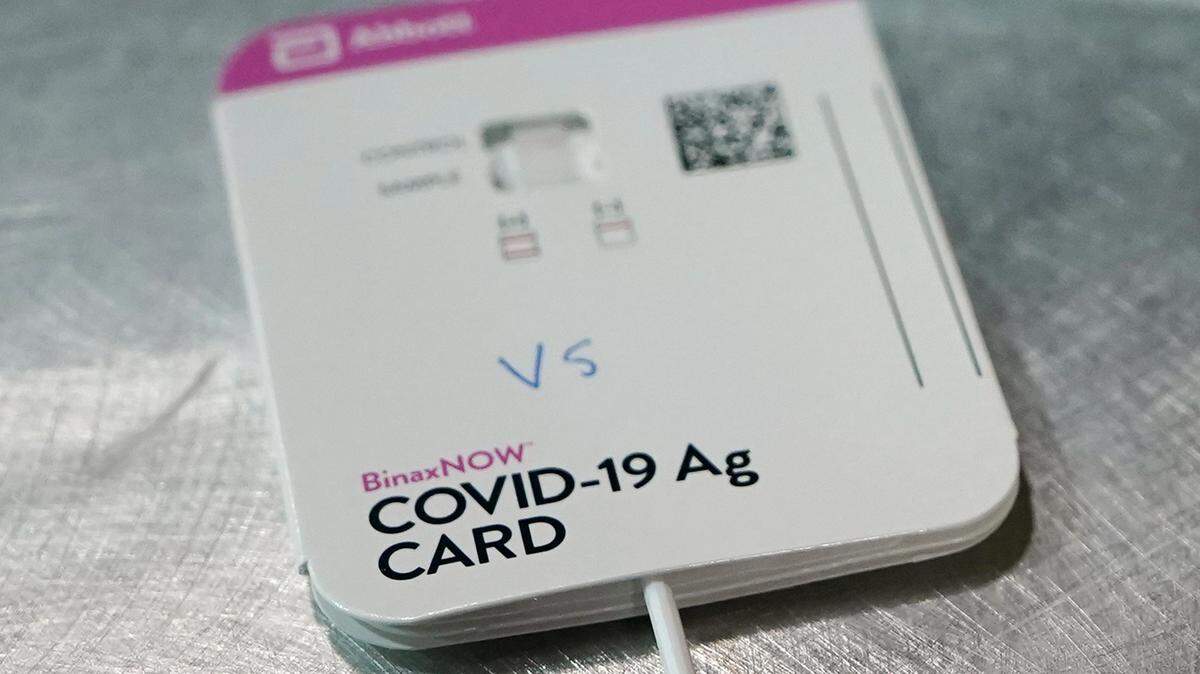 This Wednesday, Feb. 3, 2021 file photo shows a BinaxNOW rapid COVID-19 test made by Abbott Laboratories, in Tacoma, Wash.
