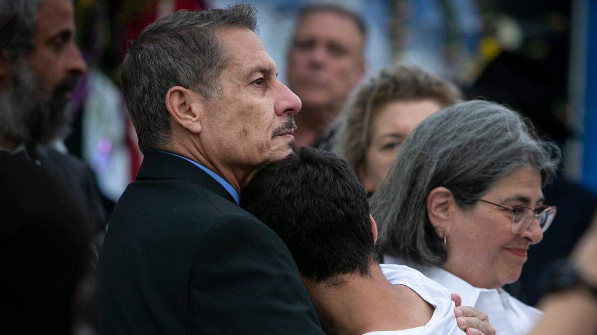 José Pepe Diaz, chairman of the Miami-Dade County Commission, visits a family center in Surfside, July 7, 2021, with Mayor Daniella Levine Cava. Diaz’s office announced Sunday, July 11, he tested positive for COVID-19. He was fully vaccinated in March.