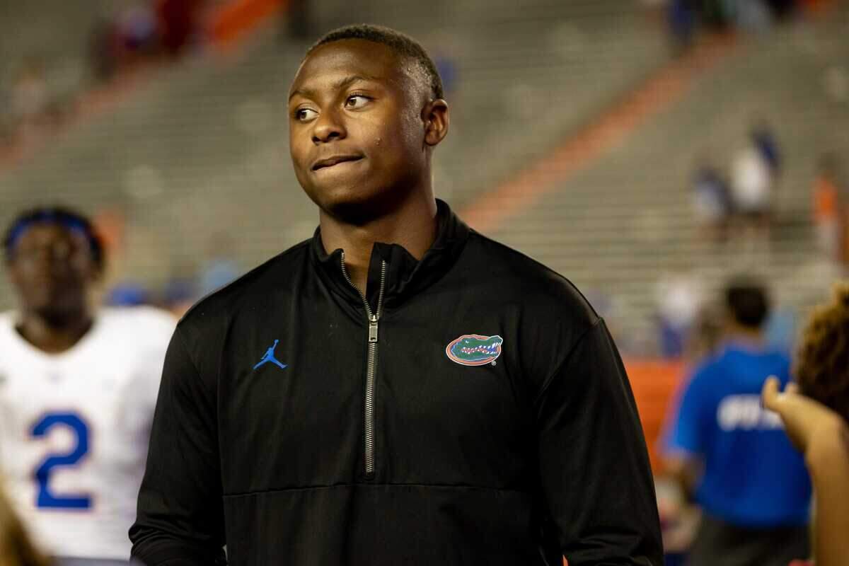 Florida Gators recruit DJ Lagway listens to Florida Gators offensive analyst for quarterbacks Ryan O’Hara speak after the game during the Florida Gators Orange and Blue Spring Game at Steve Spurrier Field at Ben Hill Griffin Stadium in Gainesville, FL on Thursday, April 13, 2023.