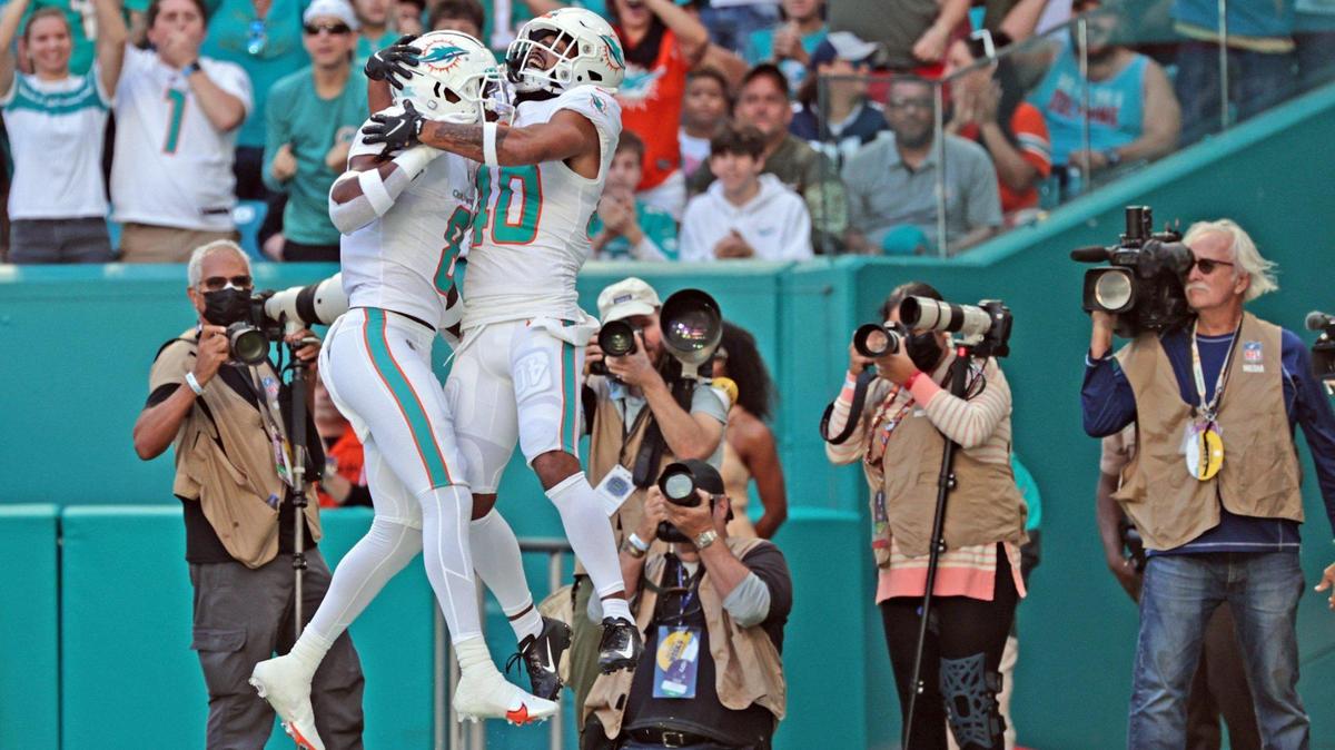 Miami Dolphins free safety Jevon Holland (8) celebrates with Miami Dolphins defensive back Nik Needham (40) after Holland intercepts the ball in the first quarter against the Houston Texans at Hard Rock Stadium in Miami Gardens on Sunday, November 7, 2021