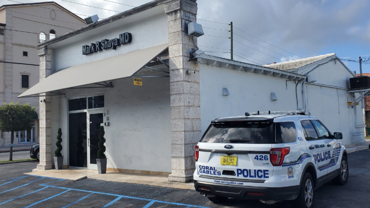 A Coral Gables Police cruiser parks outside the office of Dr. Mark Shaya after the clinic called the police on a former patient’s husband during court-ordered mediation over a billing dispute. (Photo filed in circuit court by attorney Jeffrey Davis)