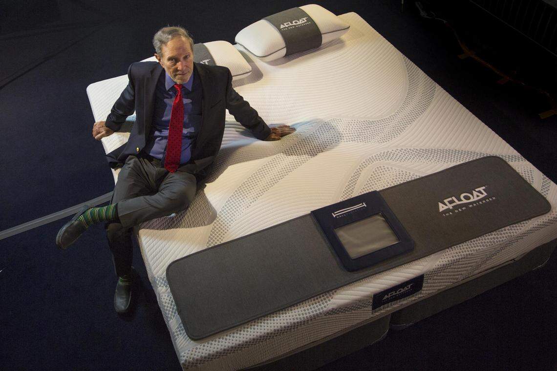 Charles Hall, the original inventor of the waterbed, shown sitting on the newest version of the water-filled mattress 50 years after the original was created, on Tuesday, June 5, 2018.