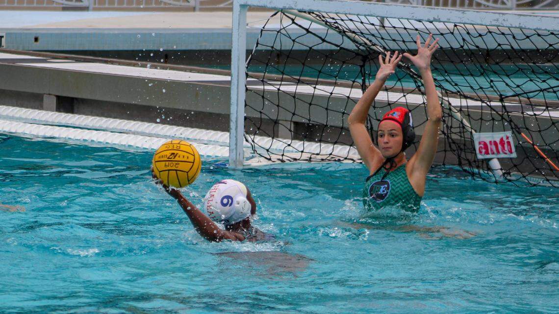 Ransom Everglades goalkeeper Claudia Pinilla had a big day as she recorded 16 saves including this one against Hialeah’s Samantha Booth as the Raiders edged the T-Breds 9-8 in a regional final Friday evening at Ransom’s pool to head to the state final four.