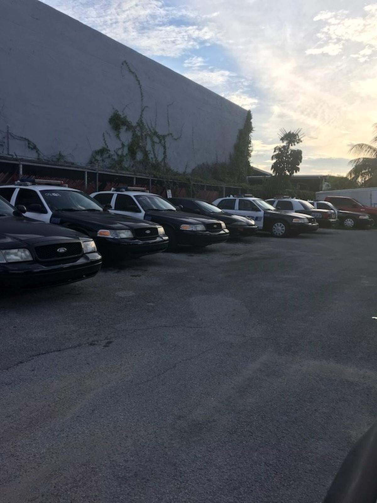 Opa-locka police now drive about a dozen old squad cars donated by Doral police. Most have over 100,000 miles on them, Opa-locka officers say.