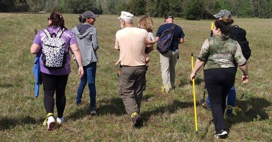 This photo shows Roy Link holding JJ after finding him safe.