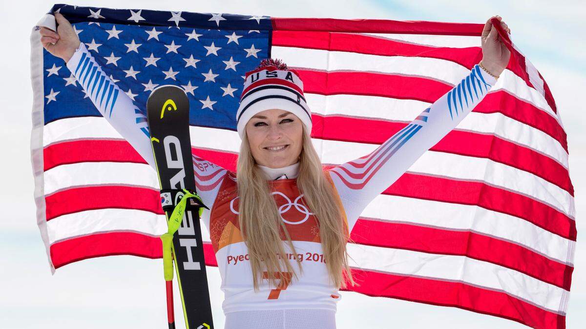 Lindsey Vonn of the USA celebrates winning the bronze medal in Women's Downhill at the Jeongseon Alpine Centre in South Korea on Wednesday, Feb. 21, 2018, during the Pyeongchang Winter Olympics.