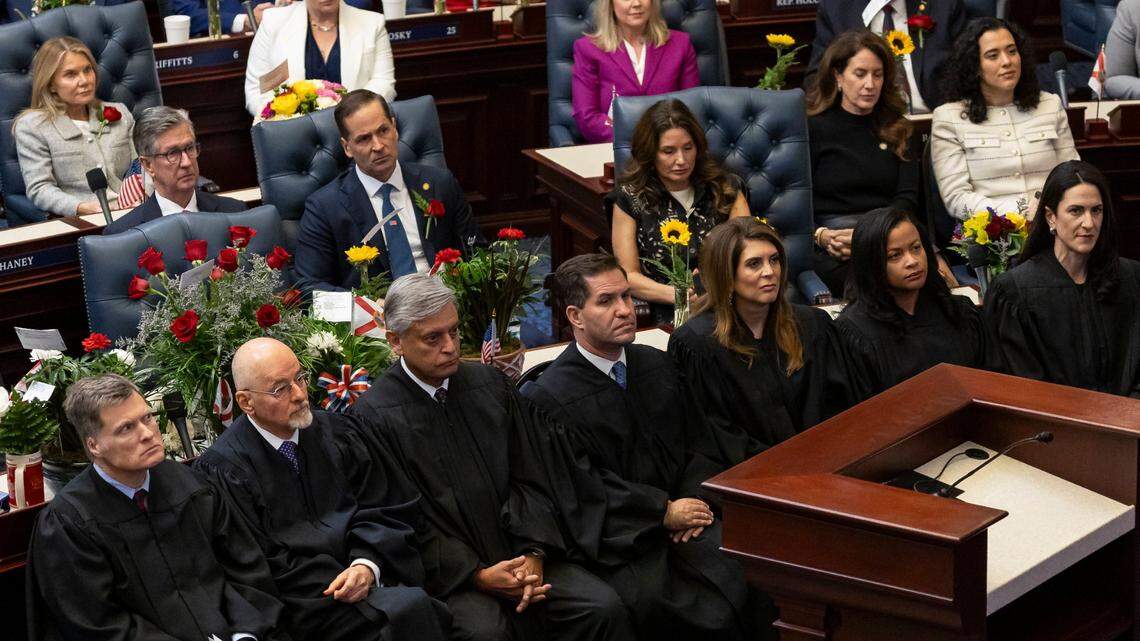 From left to right: Florida Supreme Court Justices Chief Justice Carlos G. Muñiz, Justice Charles T. Canady, Justice Jorge Labarga, Justice John D. Couriel, Justice Jamie R. Grosshans, Justice Renatha Francis and Justice Meredith L. Sasso listen to Florida Governor Ron DeSantis deliver his State of the State address during the first day of the legislative session at the Florida State Capitol on Tuesday, March 4, 2025, in Tallahassee, Fla.