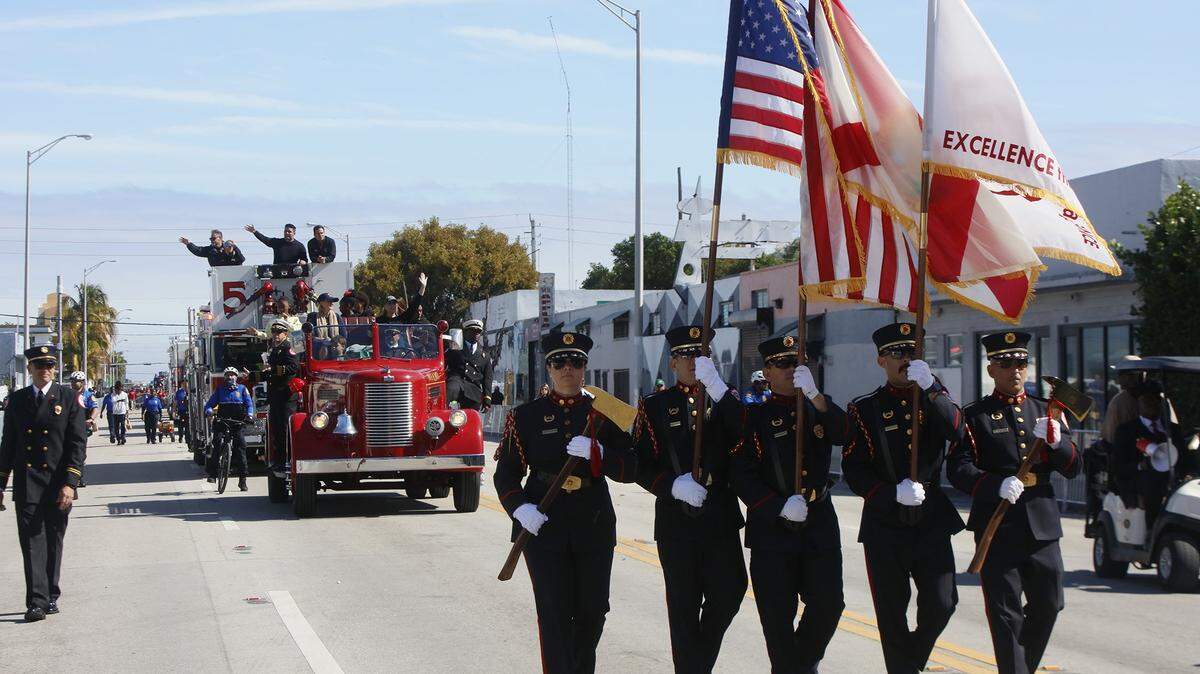 Firefighters march during the Dr. Martin Luther King Jr. Day Parade in Miami on Monday, Jan. 19, 2026.