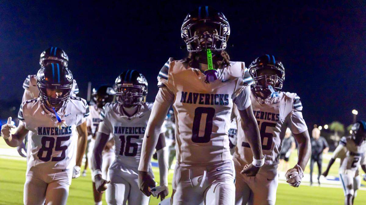 Archbishop McCarthy Mavericks players react after defeating Miami Norland Senior High School 21-14 during a high school football game at Traz Powell Stadium on Thursday, September 25, 2025, in Miami, Fla.