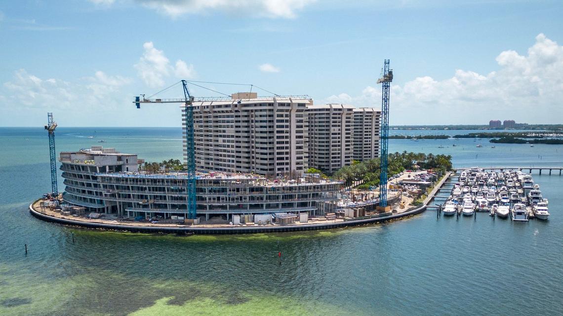 View of the construction of a new seven-story condo building in front of Building 3 on the northern edge of Grove Isle in Coconut Grove, April 18, 2024. Some residents have sued the city of Miami alleging it broke its own laws to let the condo rise.