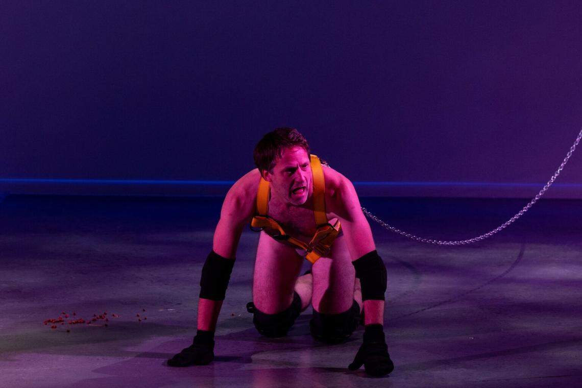 Caleb Scott as David, a performance artist, who lives as a dog in a gallery for a month in Harley Elias’s “Bad Dog” at Miami New Drama.