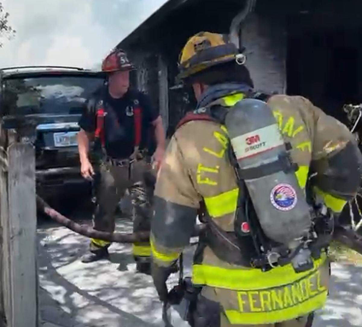 Fort Lauderdale firefighters battle a blaze at a Wilton Manors house Wednesday, April 23, 2025.